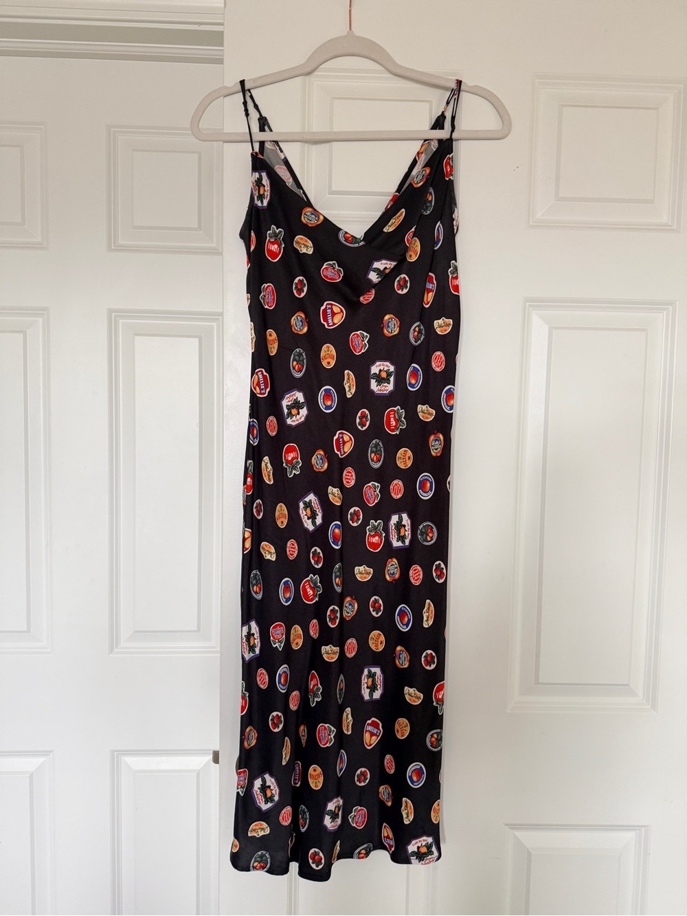 Anthropologie Black Slip Midi Dress with Colorful Badge Print